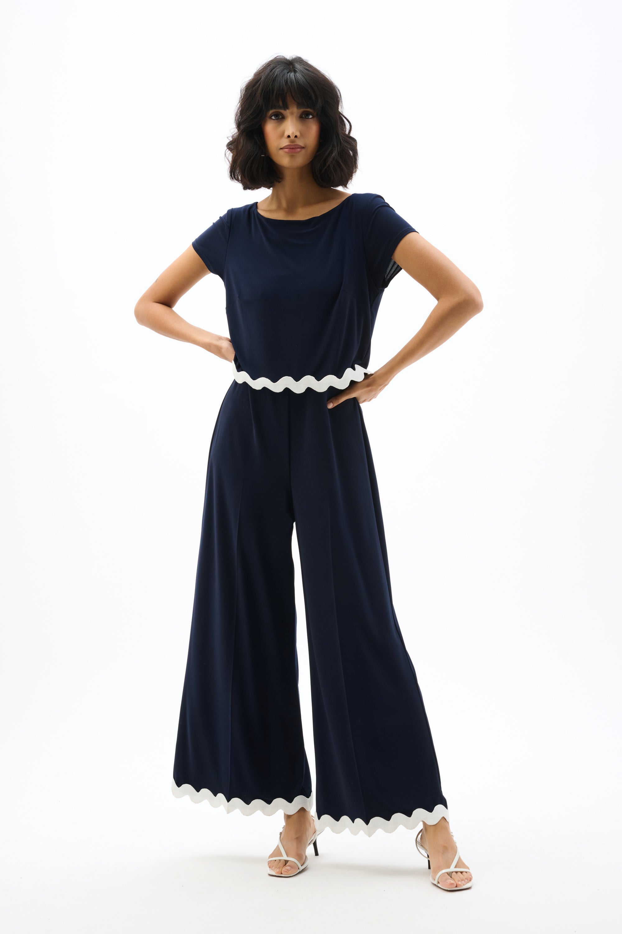 JOSEPH RIBKOFF NAVY FRILL DETAIL JUMPSUIT 262144X-2230 126