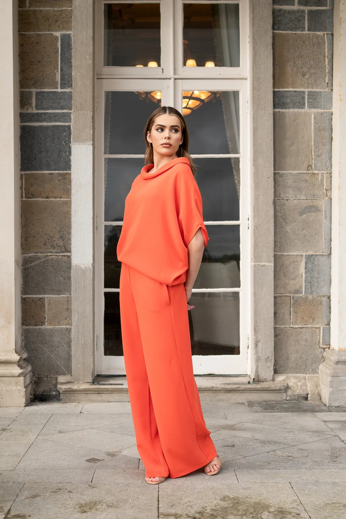 roisin linnane sage top in orange stocked at macbees ireland