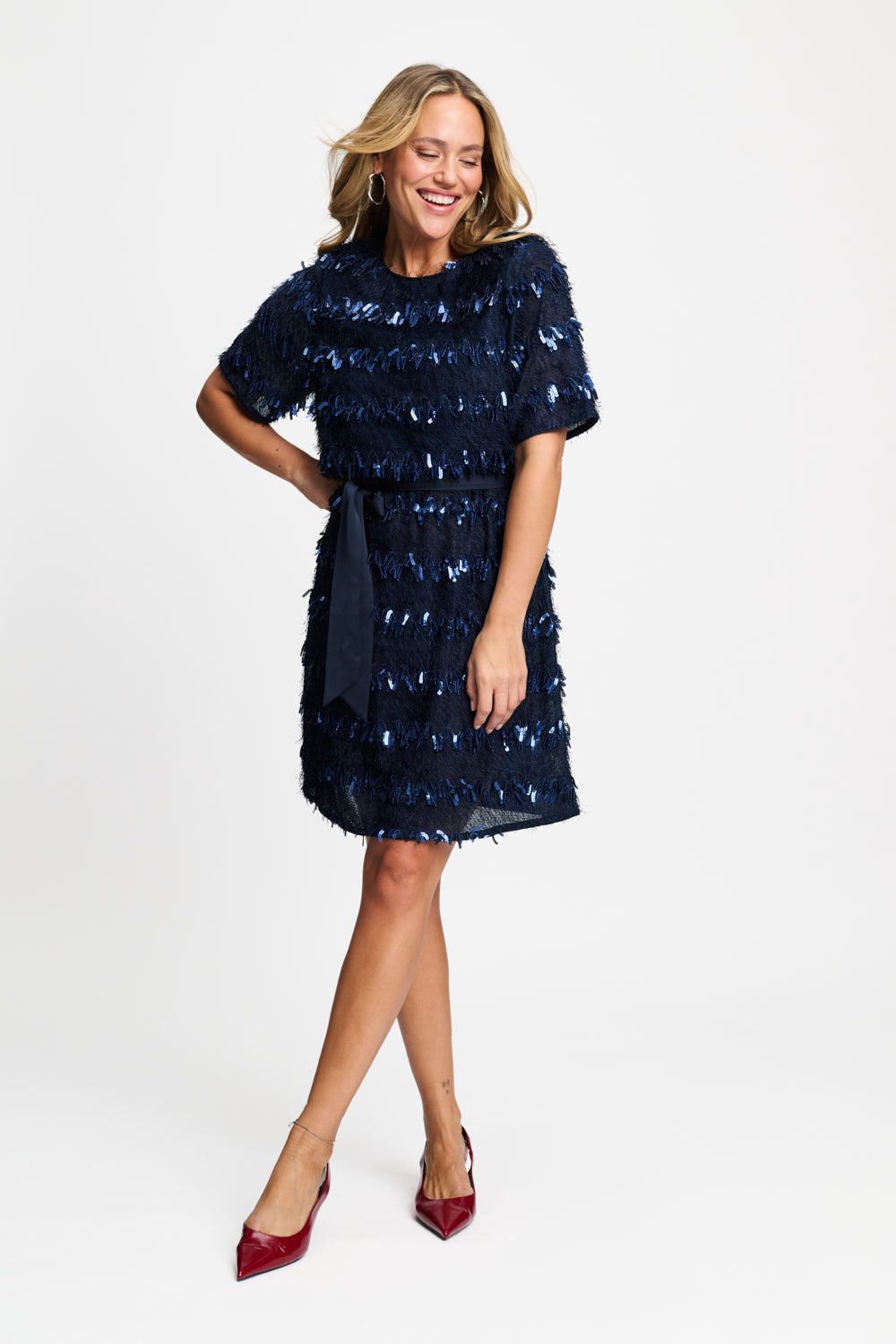 9834 pom navy sequin dress with gently puffed sleeves and tie belt going out dress