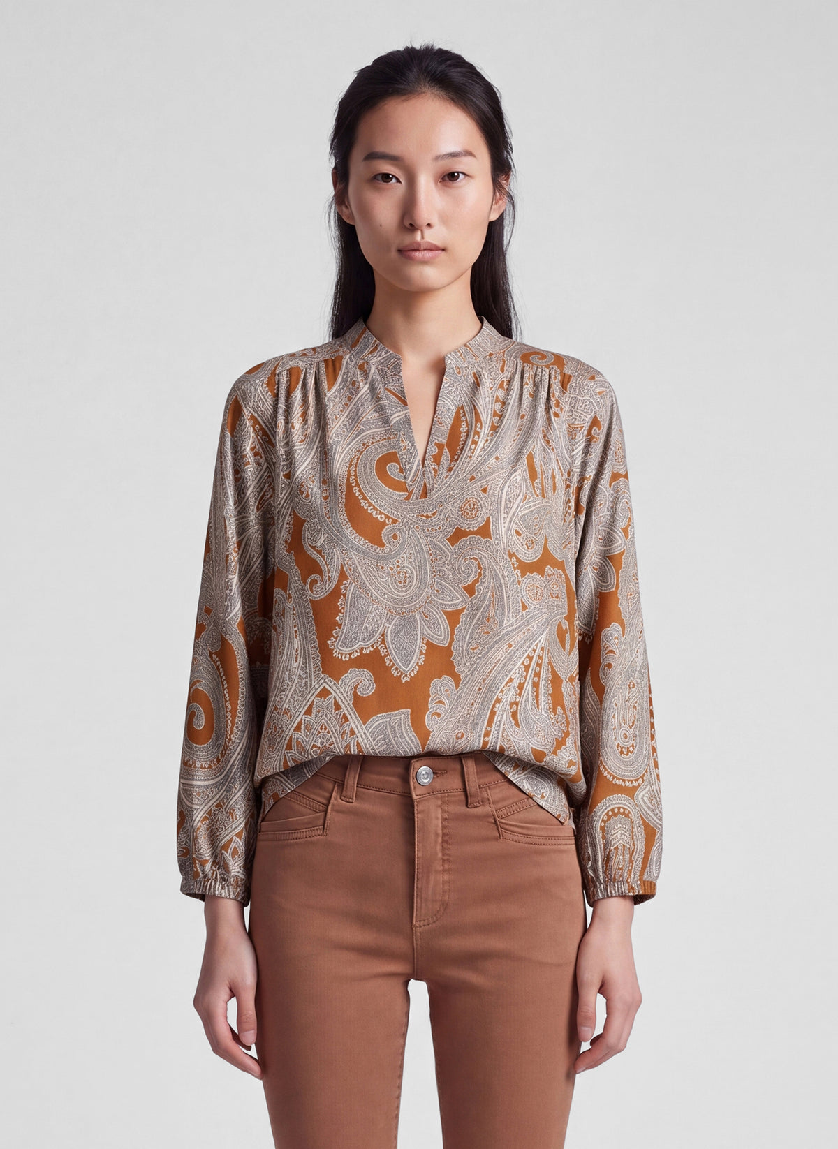 57-121109 rabe tan v-neck print blouse
