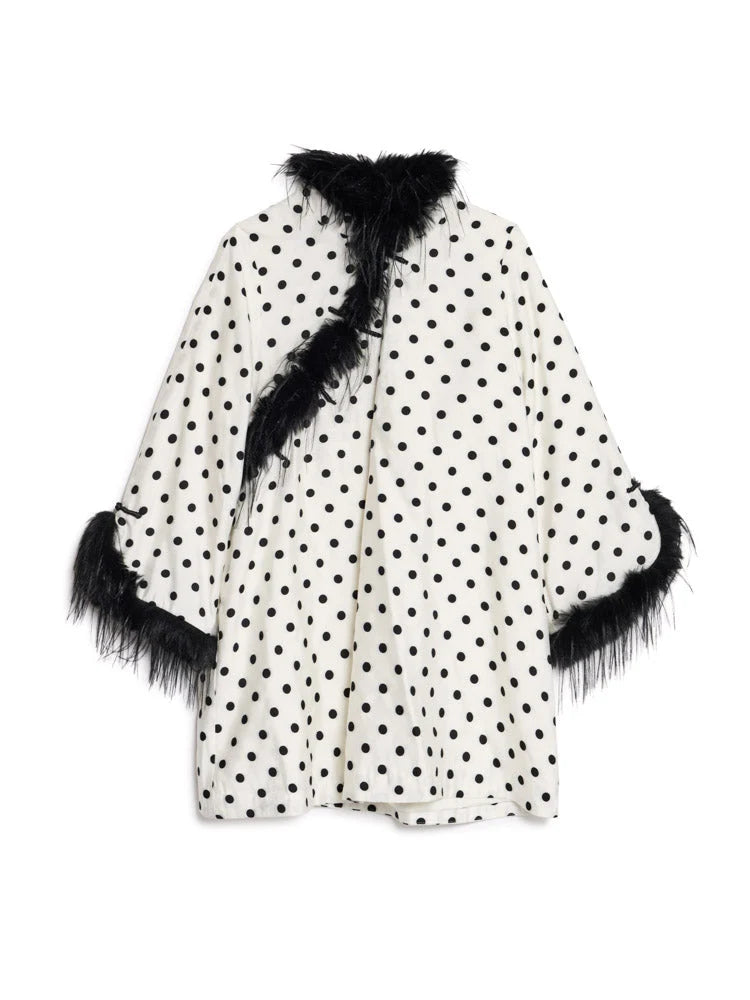 A white - line mini dress with black polka dots and black feather trim on the collar, lapels, and cuffs, shown against a plain white background.